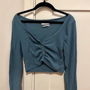 URBAN OUTFITTERS out from under cropped shirted cardigan. Blue long sleeve crop